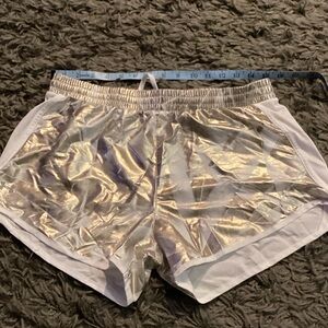 Under Armour Women's Shiny gold running Athletic Shorts